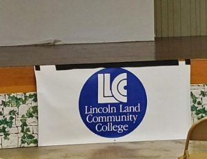 LLCC banner on talent contest stage