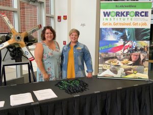Vickie Ward and Darla Cochran at table in the Workforce Careers Center