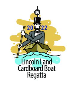 2022 Lincoln Land Cardboard Boat Regatta. Abe Lincoln paddling a cardboard boat.