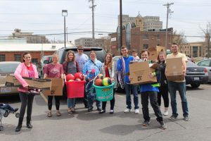 LLCC students collecting outdoor play equipment for YMCA