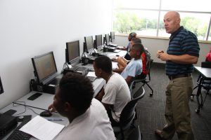 Dean Butzow teaching GIS to Career Launch teens