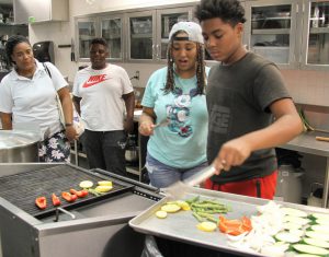 Career Launch teens grilling vegetables
