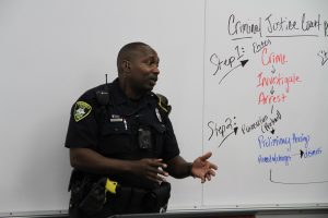 Springfield Police Department officer talking to Career Launch teens