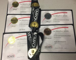 Gold Medallion Awards presented to Lincoln Land Community College, Springfield, Illinois for Communication Success Story or Community Relations Campaign 2018, Video Shorts 2018 and Folder 2018; silver for Print Advertisement 2018; and Bronze for Radio Advertisement 2018