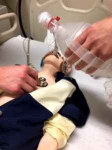 child m anikin with opened airway