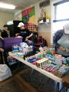 Education students preparing items for donation