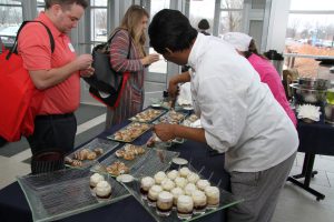 Culinary Arts students serving desserts