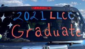 2021 LLCC Graduate written on rear windshield of vehicle