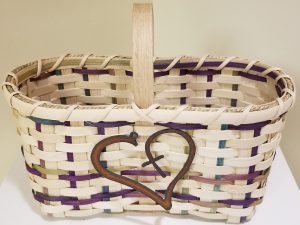 Photo of handwoven basket with metal heart