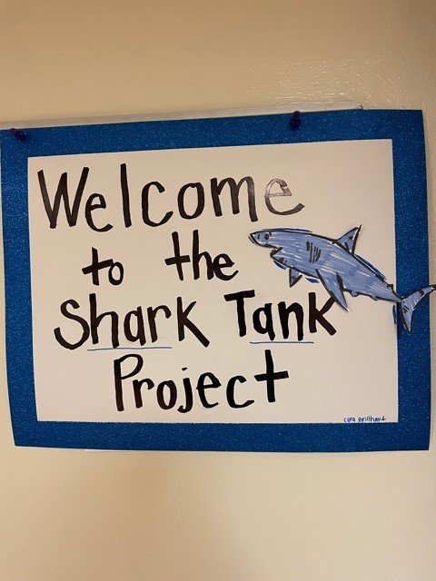 Welcome to the Shark Tank Project sign