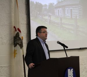 Dr. Wheeler speaking from podium