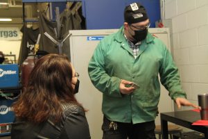 U.S. Senator Tammy Duckworth and Aidan Tierney, welding instructor