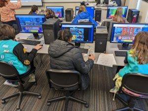 Girl Scouts at computers in a computer lab