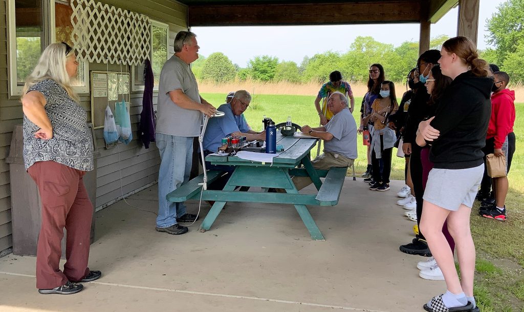 Lincoln Magnet AVID students hear from professors at the Bird Banding Station