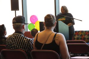 Candace Silas welcoming attendees to LLCC's Juneteenth celebration