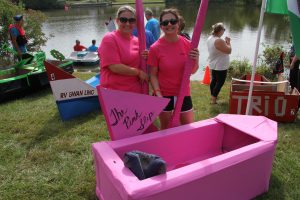 HR captains with their boat, The Pink Slip, at the starting line