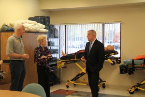 Nick Ferreira, Dr. Charlotte Warren and Senator Dick Durbin in the current LLCC EMS lab. The lab will be expanded along with the addition of a working ambulance and simulators, allowing more than 400 students to enroll each year in EMT, Advanced EMT and Paramedic training.