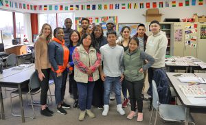 Sen. Hunter with ESL students and instructor