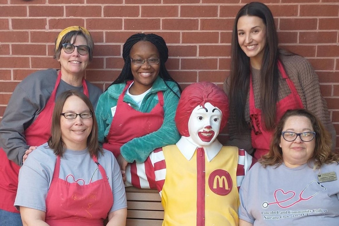 IV Leaguers and advisors with Ronald McDonald