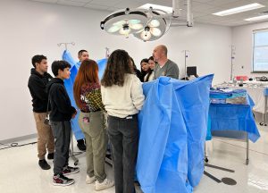 BHS students in the surgical technology lab, which looks like an operating room