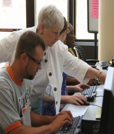Photo of Janet Miller assisting students