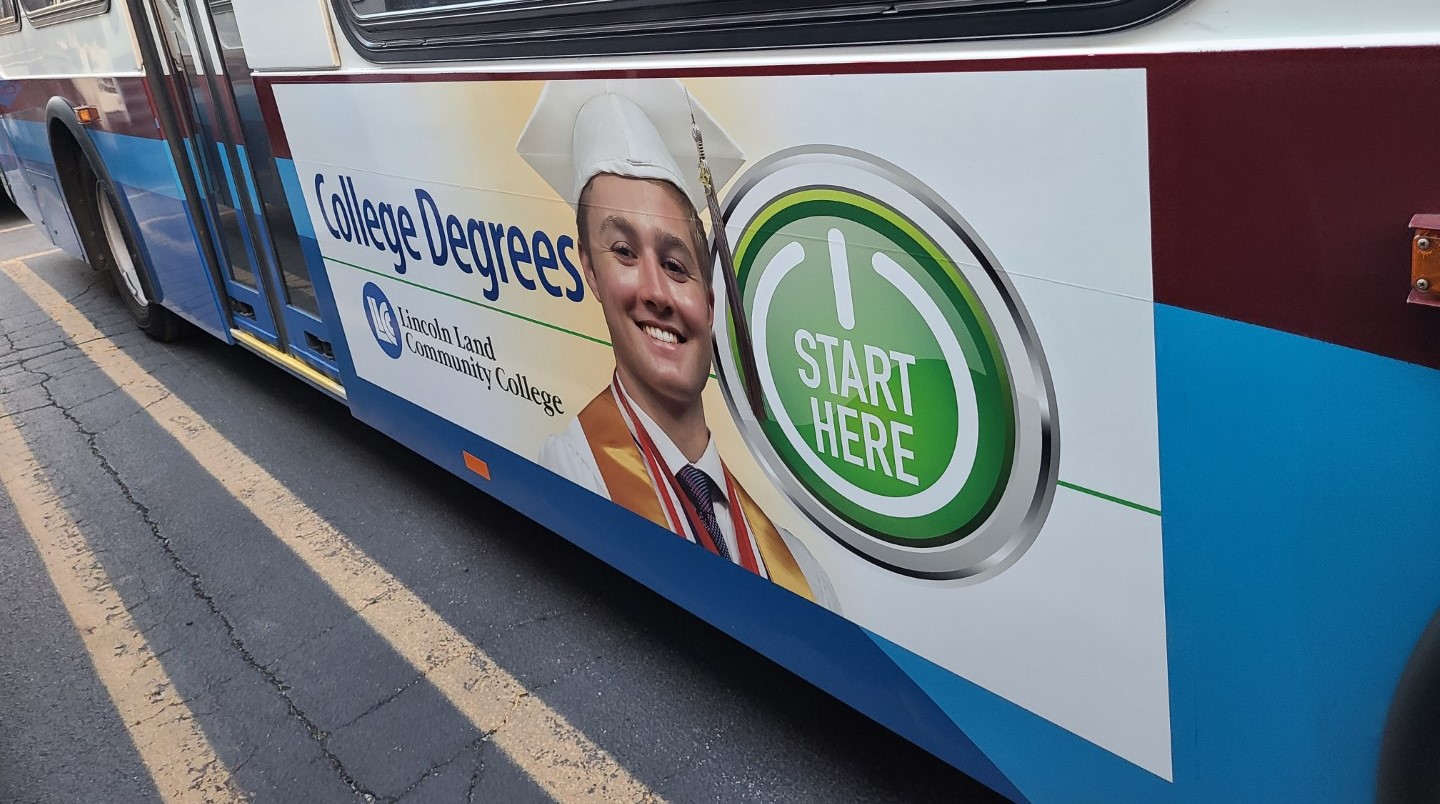 On side of bus: College Degrees. Start Here button. Lincoln Land Community College.