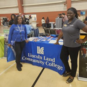 Laurie Clemons and Kim Wilson at the LLCC table.