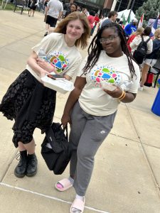 Two students in Multicultural Fest T-shirts