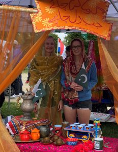 Two students at a Multicultural Fest exhibit