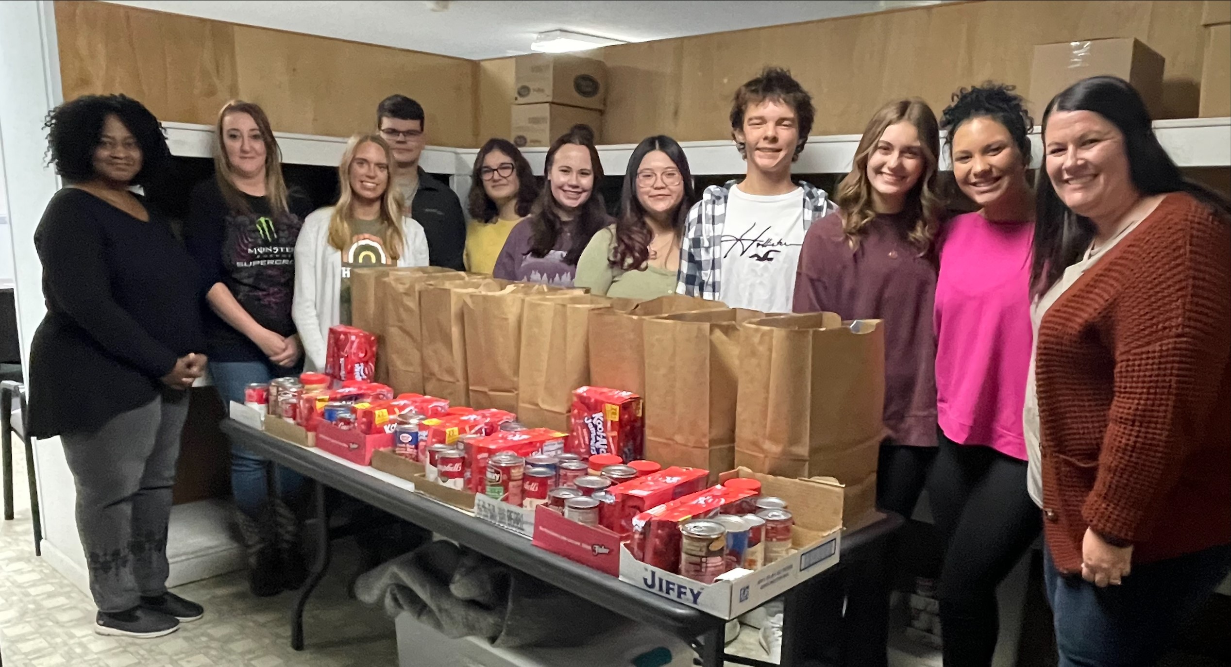 CEFS employees, LLCC students and LLCC-Litchfield staff with donated food items