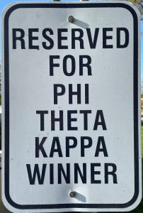 Parking sign that reads - Reserved for Phi Theta Kappa Winner.