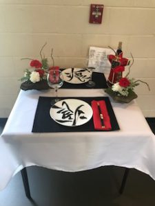 Decorated table in red adn black decor.