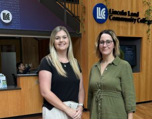 Sarah Frey and Whitney Brandenburg pose for a photo in A. Lincoln Commons.