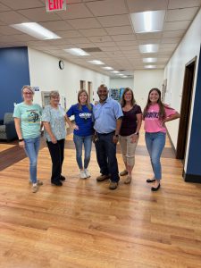 Ira Bradley posing with the LLCC-Jacksonville team.