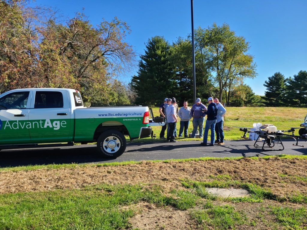 LLCC Ag students standing in an area receiving directions from an instructor.