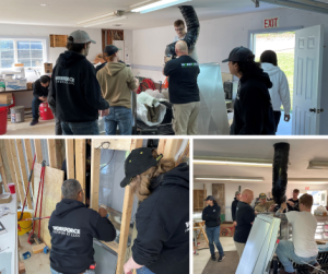 HVACR students intalling a heat pump in a new building.