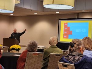 Tony Rothering delivering a presentation on his bird banding research.