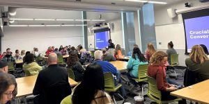 LLCC faculty and staff in a classroom.